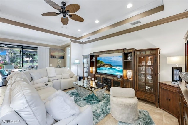 11177 Monte Carlo Blvd, Bonita Springs, FL 34135 - living room featuring ceiling fan, ornamental molding, light tile patterned floors, a raised ceiling, and recessed lighting