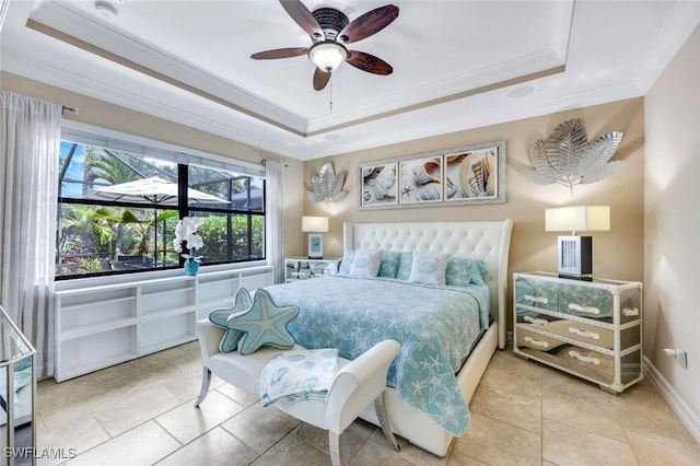 11177 Monte Carlo Blvd, Bonita Springs, FL 34135 - tiled bedroom featuring a tray ceiling, ornamental molding, and a ceiling fan