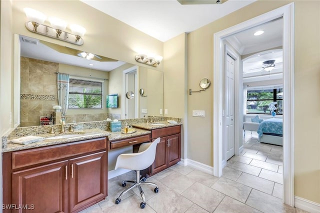 11177 Monte Carlo Blvd, Bonita Springs, FL 34135 - ensuite bathroom with ceiling fan, double vanity, and tile patterned flooring