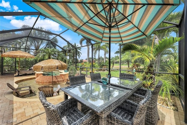 11177 Monte Carlo Blvd, Bonita Springs, FL 34135 - view of patio / terrace with glass enclosure and outdoor dining area