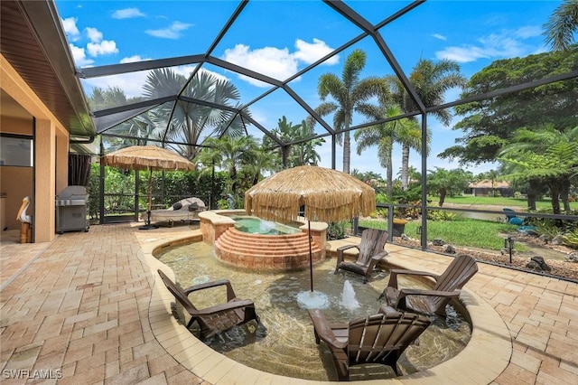 11177 Monte Carlo Blvd, Bonita Springs, FL 34135 - view of patio / terrace with a grill, a lanai, and a pool with connected hot tub