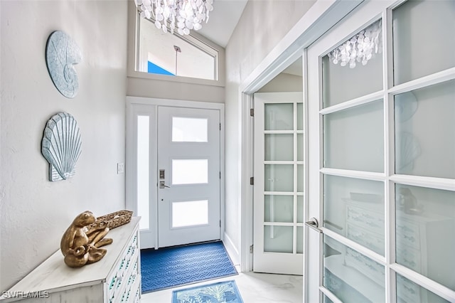 1226 Par View Dr, Sanibel, FL 33957 - entrance foyer featuring a chandelier