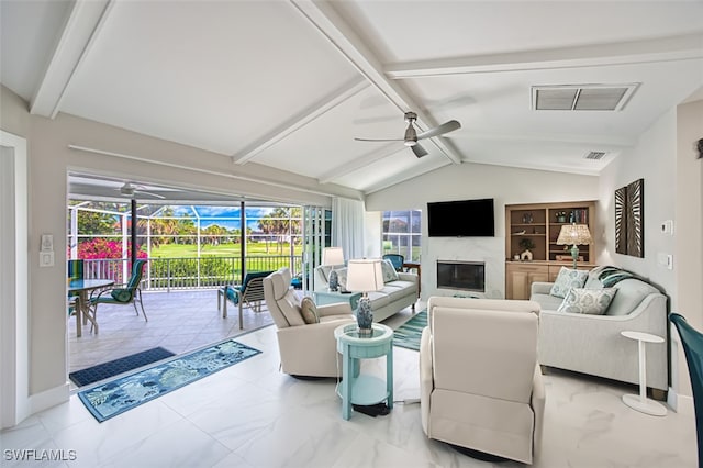 1226 Par View Dr, Sanibel, FL 33957 - living room featuring a ceiling fan, marble look tile flooring, a sunroom, and a glass covered fireplace