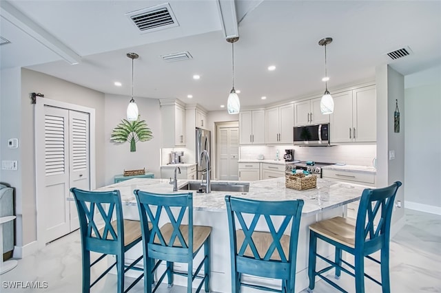 1226 Par View Dr, Sanibel, FL 33957 - kitchen featuring stainless steel appliances, baseboards, recessed lighting, white cabinets, and tasteful backsplash