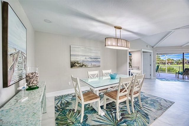 1226 Par View Dr, Sanibel, FL 33957 - dining space with lofted ceiling and baseboards