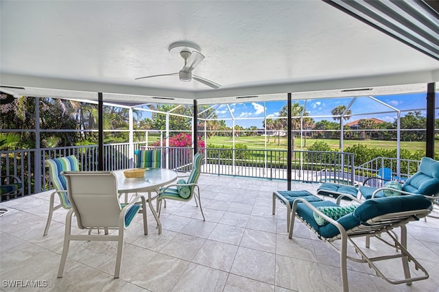 1226 Par View Dr, Sanibel, FL 33957 - sunroom with a ceiling fan and golf course view
