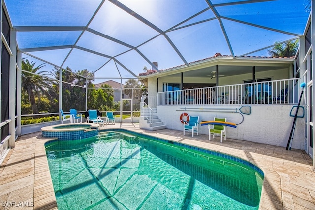 1226 Par View Dr, Sanibel, FL 33957 - view of pool with a patio area, ceiling fan, a pool with connected hot tub, and glass enclosure