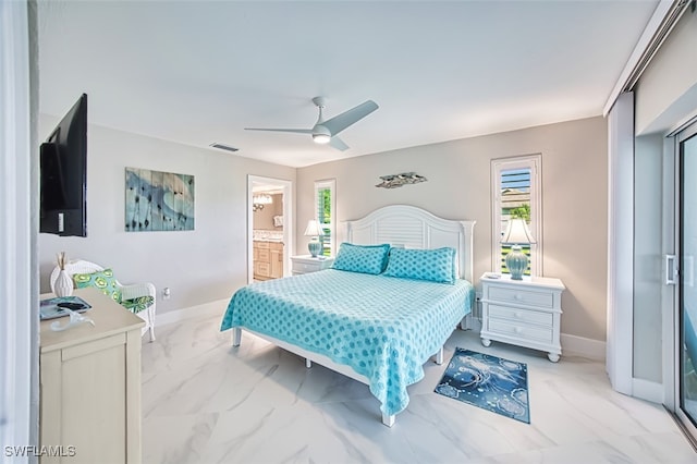 1226 Par View Dr, Sanibel, FL 33957 - bedroom featuring multiple windows, ceiling fan, baseboards, and light marble finish floors