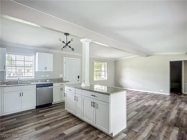 93 E Mariana Ave, North Fort Myers, FL 33917 - kitchen with stainless steel dishwasher, ornate columns, open floor plan, dark wood finished floors, and crown molding