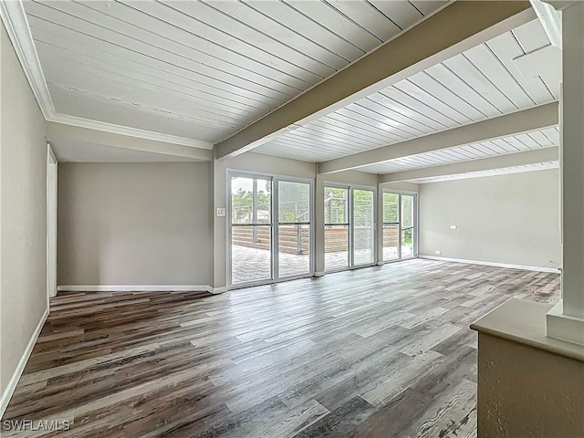 93 E Mariana Ave, North Fort Myers, FL 33917 - unfurnished room with wood finished floors and beam ceiling