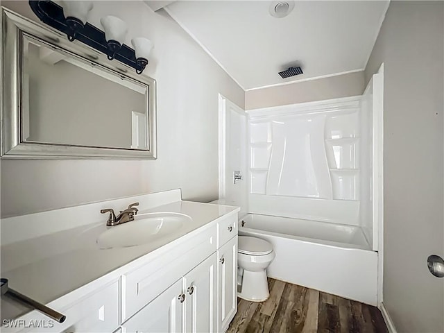93 E Mariana Ave, North Fort Myers, FL 33917 - full bathroom with vanity, wood finished floors, and washtub / shower combination