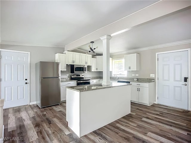 93 E Mariana Ave, North Fort Myers, FL 33917 - kitchen featuring appliances with stainless steel finishes, decorative columns, crown molding, white cabinets, and light stone countertops