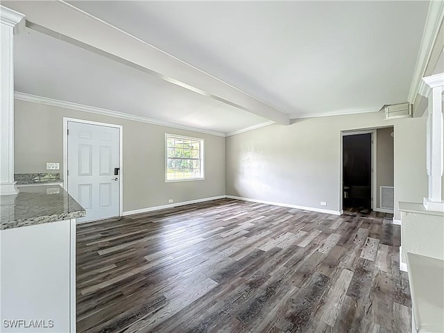 93 E Mariana Ave, North Fort Myers, FL 33917 - unfurnished living room with dark wood-style floors, ornamental molding, beam ceiling, and decorative columns