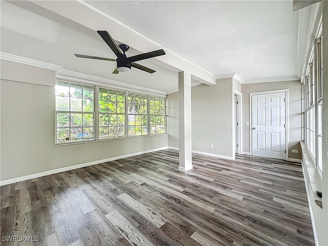 93 E Mariana Ave, North Fort Myers, FL 33917 - empty room featuring a ceiling fan, dark wood-style flooring, crown molding, and beam ceiling