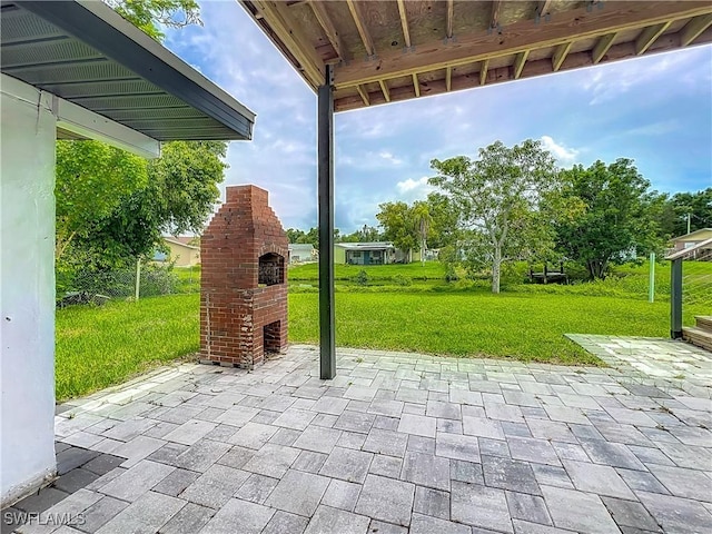 93 E Mariana Ave, North Fort Myers, FL 33917 - view of patio / terrace with an outdoor brick fireplace