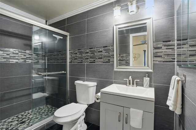 4903 Bygone St, Lehigh Acres, FL 33971 - bathroom featuring tile walls, vanity, a shower stall, and crown molding