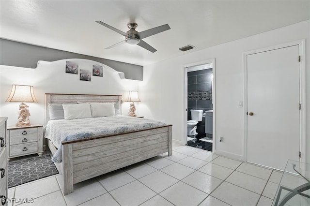 4903 Bygone St, Lehigh Acres, FL 33971 - bedroom with light tile patterned flooring, ceiling fan, and ensuite bathroom