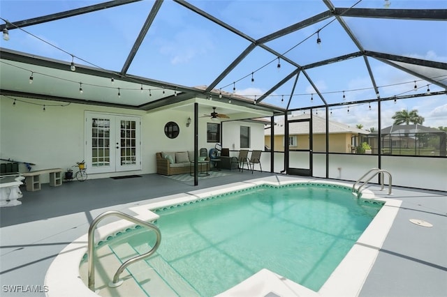 4903 Bygone St, Lehigh Acres, FL 33971 - outdoor pool featuring french doors, a patio, ceiling fan, an outdoor hangout area, and a lanai