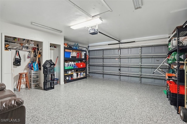 4903 Bygone St, Lehigh Acres, FL 33971 - garage featuring a garage door opener