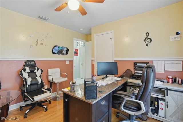 4903 Bygone St, Lehigh Acres, FL 33971 - home office with a ceiling fan and light wood-style flooring