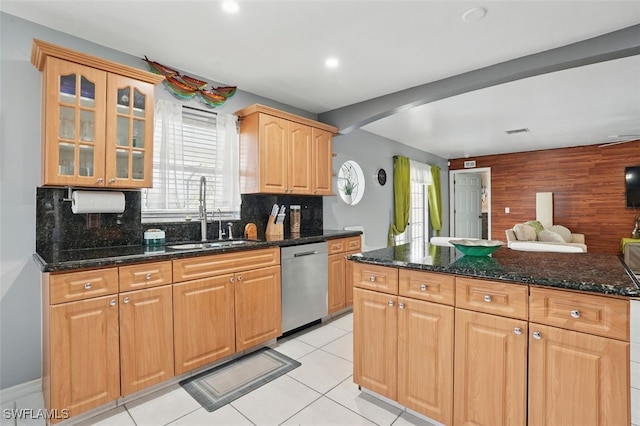 4903 Bygone St, Lehigh Acres, FL 33971 - kitchen featuring stainless steel dishwasher, arched walkways, decorative backsplash, glass insert cabinets, and dark stone counters