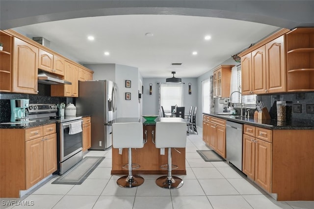 4903 Bygone St, Lehigh Acres, FL 33971 - kitchen with open shelves, stainless steel appliances, a kitchen island, under cabinet range hood, and recessed lighting