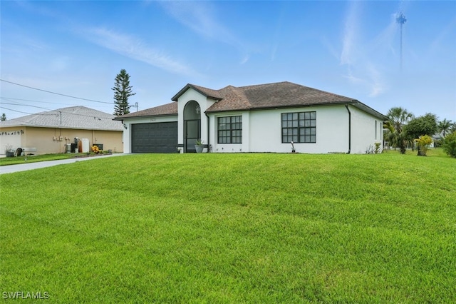 4903 Bygone St, Lehigh Acres, FL 33971 - ranch-style house featuring an attached garage, stucco siding, concrete driveway, and a front yard