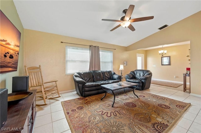 2012 SW 8th Ct, Cape Coral, FL 33991 - living area with light tile patterned floors, ceiling fan, healthy amount of natural light, a chandelier, and lofted ceiling