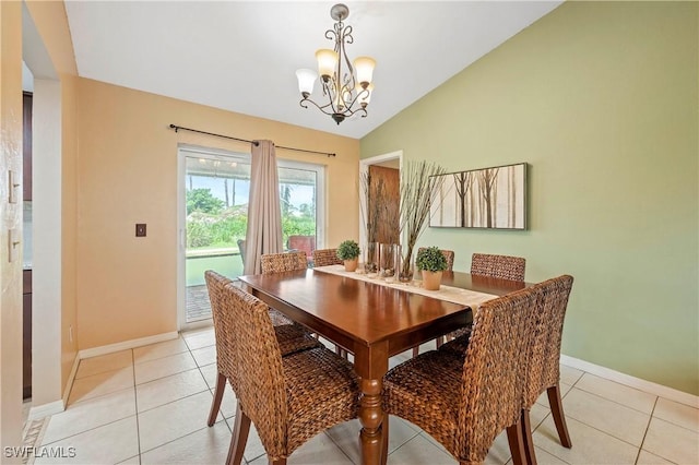 2012 SW 8th Ct, Cape Coral, FL 33991 - dining area with lofted ceiling, a chandelier, baseboards, and light tile patterned flooring