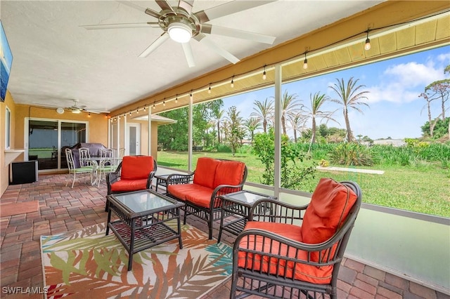 2012 SW 8th Ct, Cape Coral, FL 33991 - sunroom / solarium with ceiling fan and outdoor lounge area