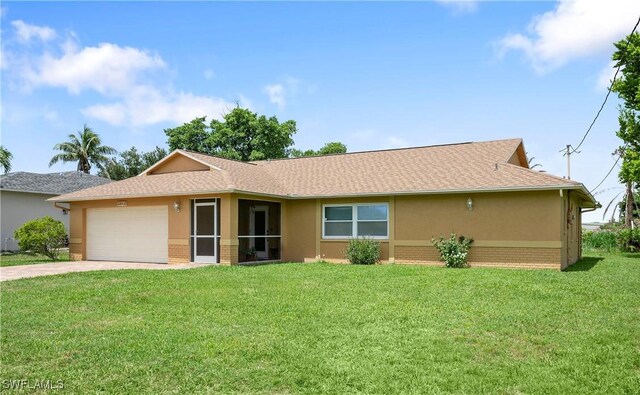 2012 SW 8th Ct, Cape Coral, FL 33991 - single story home featuring stucco siding, driveway, an attached garage, a front lawn, and brick siding