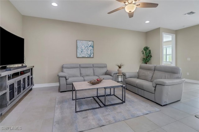14594 Tropical Dr, Naples, FL 34114 - living room featuring a ceiling fan, baseboards, light tile patterned floors, and recessed lighting