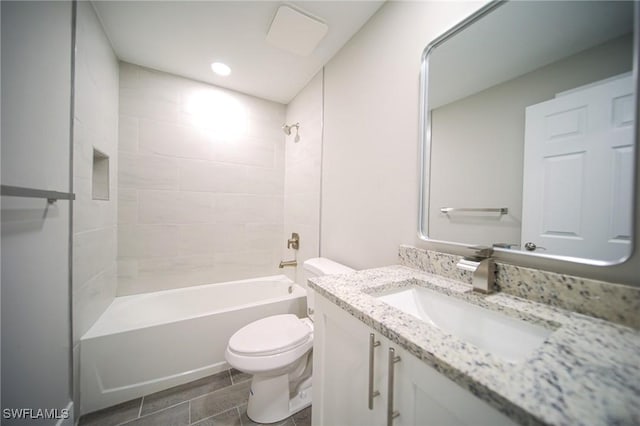 374 Pennfield St, Lehigh Acres, FL 33974 - bathroom with vanity, toilet, and tub / shower combination