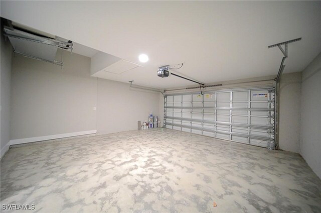 374 Pennfield St, Lehigh Acres, FL 33974 - garage featuring a garage door opener