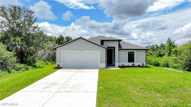 374 Pennfield St, Lehigh Acres, FL 33974 - view of front of home with a garage, driveway, stucco siding, a front yard, and a shingled roof