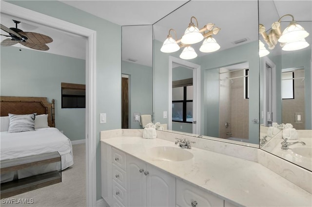 740 N Collier Blvd Unit 206, Marco Island, FL 34145 - ensuite bathroom featuring vanity, a shower, baseboards, and ceiling fan