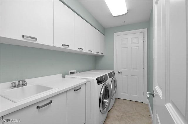 740 N Collier Blvd Unit 206, Marco Island, FL 34145 - washroom featuring cabinet space, independent washer and dryer, and light tile patterned floors