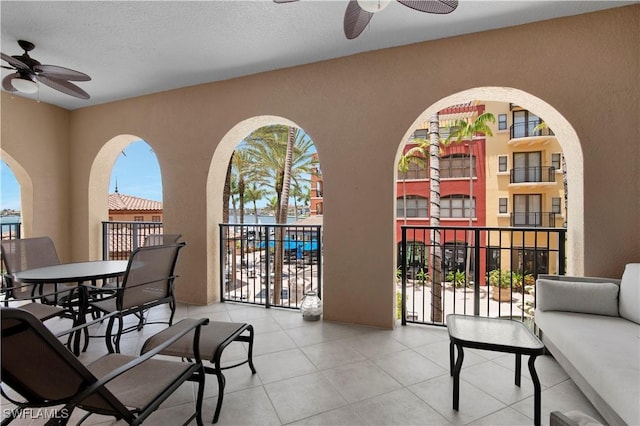 740 N Collier Blvd Unit 206, Marco Island, FL 34145 - view of patio / terrace with a ceiling fan and a balcony