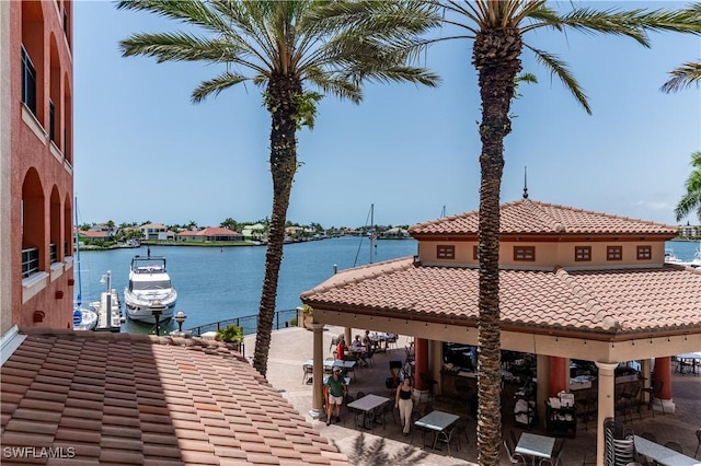 740 N Collier Blvd Unit 206, Marco Island, FL 34145 - dock with a gazebo, a water view, and a patio