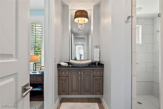 12147 Colliers Reserve Dr, Naples, FL 34110 - bathroom with vanity and a shower stall