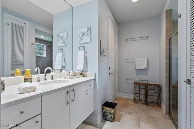 12147 Colliers Reserve Dr, Naples, FL 34110 - bathroom with vanity, a closet, and a shower stall