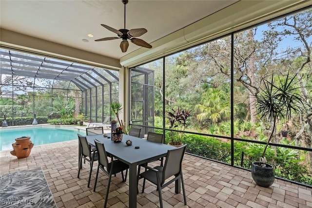 12147 Colliers Reserve Dr, Naples, FL 34110 - sunroom with ceiling fan and outdoor dining area