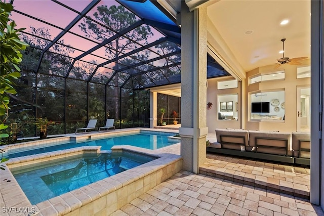 12147 Colliers Reserve Dr, Naples, FL 34110 - view of pool with a patio, glass enclosure, and a pool with connected hot tub