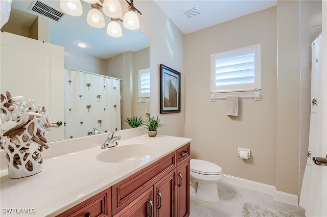 3881 Kens Way Unit 4301, Bonita Springs, FL 34134 - full bath with toilet, vanity, plenty of natural light, and baseboards