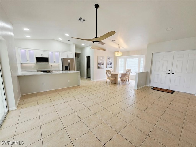 1221 SW 10th Ter, Cape Coral, FL 33991 - living area featuring recessed lighting, vaulted ceiling, light tile patterned floors, baseboards, and a ceiling fan