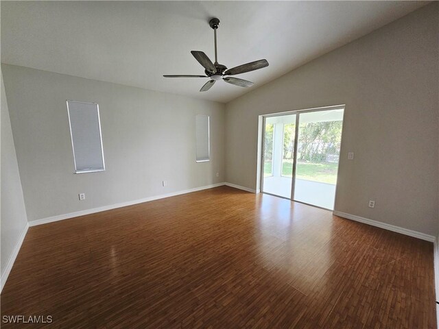 1221 SW 10th Ter, Cape Coral, FL 33991 - unfurnished room with wood finished floors, vaulted ceiling, a ceiling fan, and baseboards