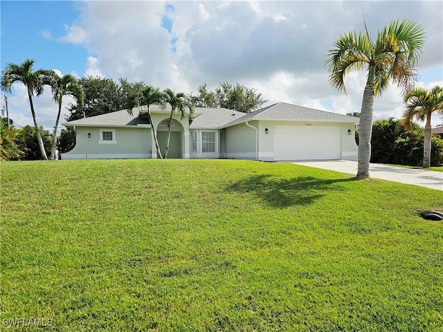 1221 SW 10th Ter, Cape Coral, FL 33991 - ranch-style house featuring a garage, concrete driveway, a front yard, and stucco siding