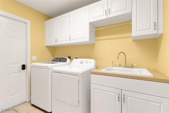 1622 SE 20th St, Cape Coral, FL 33990 - washroom featuring washer and dryer, cabinet space, and light tile patterned floors
