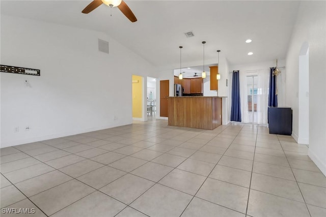 1622 SE 20th St, Cape Coral, FL 33990 - unfurnished living room featuring lofted ceiling, a ceiling fan, light tile patterned flooring, recessed lighting, and baseboards