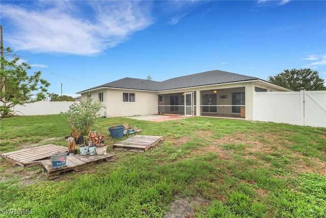 1622 SE 20th St, Cape Coral, FL 33990 - rear view of property featuring a sunroom, a deck, roof with shingles, and stucco siding
